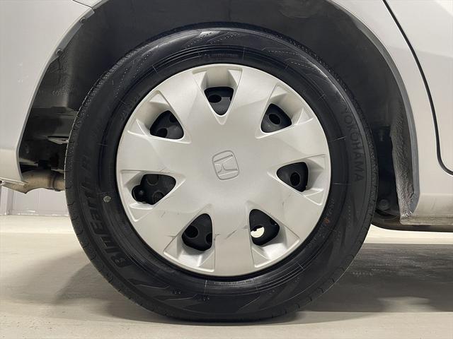 フリード 　１．５Ｇ　福祉車両・助手席リフトＵＰシート・６人乗・走行１６千Ｋ・左電動スライドドア・ＣＤオーディオ・左右スライドドア・キーレス・リモコン・折り畳み車イス固定ネット・左右ＳＤ・純正ＨＩＤヘッドライト（40枚目）