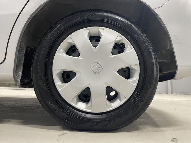 フリード 　１．５Ｇ　福祉車両・助手席リフトＵＰシート・６人乗・走行１６千Ｋ・左電動スライドドア・ＣＤオーディオ・左右スライドドア・キーレス・リモコン・折り畳み車イス固定ネット・左右ＳＤ・純正ＨＩＤヘッドライト（41枚目）