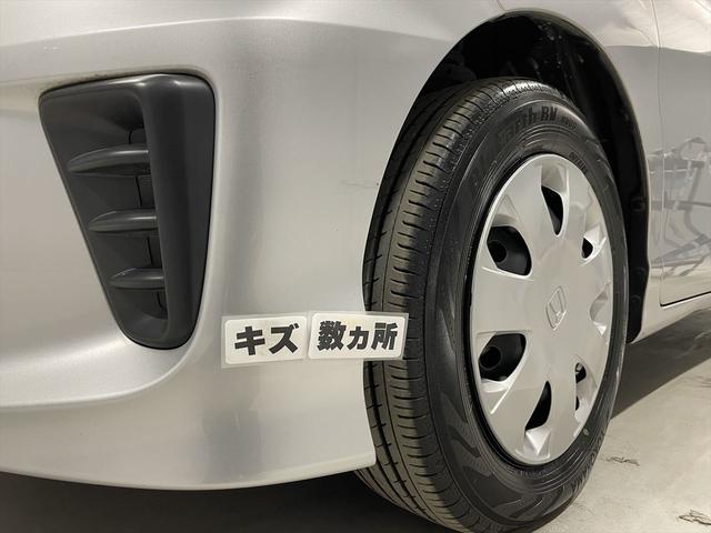 フリード 　１．５Ｇ　福祉車両・助手席リフトＵＰシート・６人乗・走行１６千Ｋ・左電動スライドドア・ＣＤオーディオ・左右スライドドア・キーレス・リモコン・折り畳み車イス固定ネット・左右ＳＤ・純正ＨＩＤヘッドライト（51枚目）