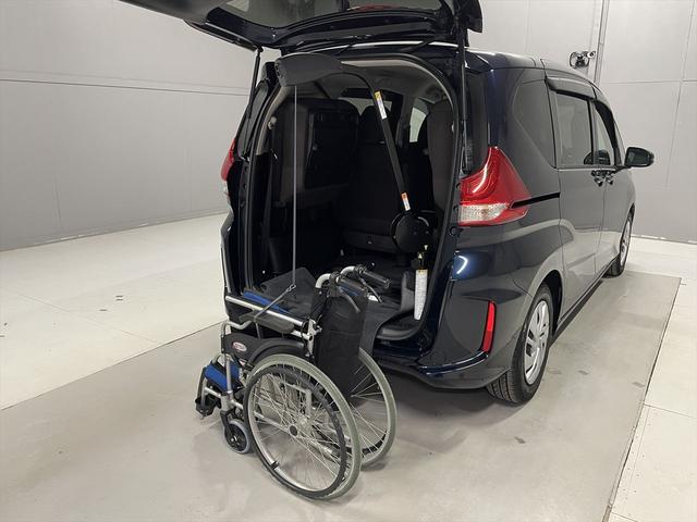 フリード  1.5G 福祉車両・助手席リフトUPシート・6人乗・走行11千K・ホンダセンシング・電動車イス収納装置・ナビ・TV・Bモニター・左右電動スライドドア・プッシュスタート・スマートキー・リモコン・禁煙車(17枚目)