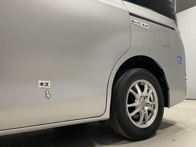 ヴォクシー 　福祉車両・電動スロープ・１台積・７人乗・走行５１千Ｋ・タイプ１・左右電動スライドドア・キーレス・純正高さ調整式ストレッチャー付・電動ウィンチ・純正９インチナビ・ＴＶフルセグ・Ｂカメラ・ＤＶＤ再生（56枚目）