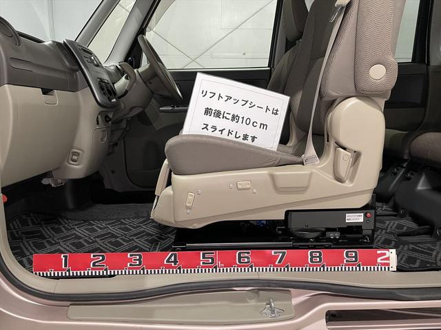 タント 　福祉車両・助手席リフトＵＰシート４人乗・走行８７千Ｋ・ＣＤオーディオ・キーレス・シートリフトリモコン付・左スライドドア・折リ畳ミ車イス固定ベルト・アイドリングストップ・禁煙車・ＰＶガラス・ドアバイザー（11枚目）