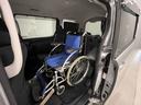　福祉車両・手動スロープ・１台積・７人乗・走行３３千Ｋ・タイプ１・リクライニング車いす乗車カノウ・ＴＶ・ナビ・Ｂモニター・ワンオーナー・左電動スライドドア・キーレス・ニールダウン・車椅子後退防止ベルト（19枚目）