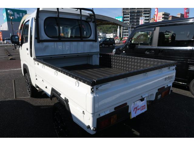 ハイゼットトラック 　セレクト４ＷＤ車　ルーフラック　ナビ　フルセグ　パーキングサポート　荷台ジェラルミン加工　アイドリングストップ　作業灯　社外１５インチアルミホイール　マッドタイヤ　オーバーフェンダー　エアロ（5枚目）