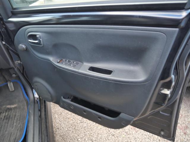 エッセ カスタム　ＣＤ　キーレスエントリー　ＥＴＣ　電動格納ミラー　プライバシーガラス　セキュリティ　純正１４インチアルミホイール　パワーウィンドウ　パワーステアリング（12枚目）