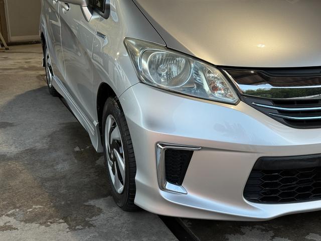 フリードハイブリッド ハイブリッド　プレミアムエディション　両側電動スライドドア／純正ナビ／ＣＤ／ＤＶＤ／ＢＬＵＥＴＯＯＴＨ／バックカメラ／後席フリップダウンモニター／ＥＴＣ／コーティング施工／禁煙車（19枚目）