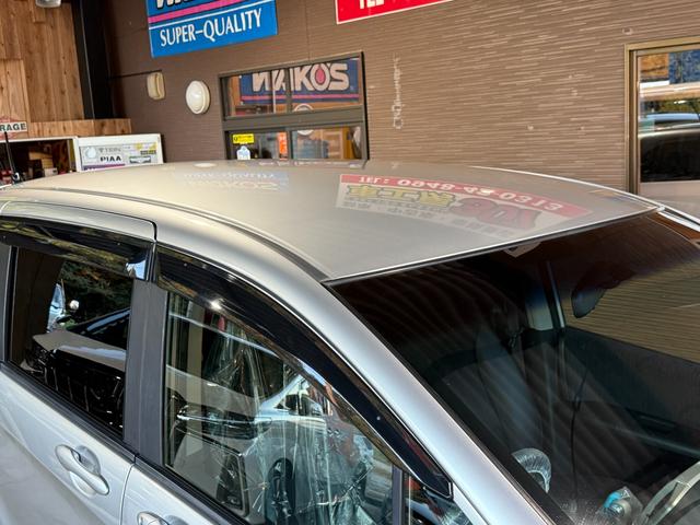 フリードハイブリッド ハイブリッド　プレミアムエディション　両側電動スライドドア／純正ナビ／ＣＤ／ＤＶＤ／ＢＬＵＥＴＯＯＴＨ／バックカメラ／後席フリップダウンモニター／ＥＴＣ／コーティング施工／禁煙車（21枚目）