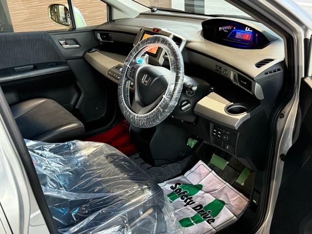 フリードハイブリッド ハイブリッド　プレミアムエディション　両側電動スライドドア／純正ナビ／ＣＤ／ＤＶＤ／ＢＬＵＥＴＯＯＴＨ／バックカメラ／後席フリップダウンモニター／ＥＴＣ／コーティング施工／禁煙車（34枚目）
