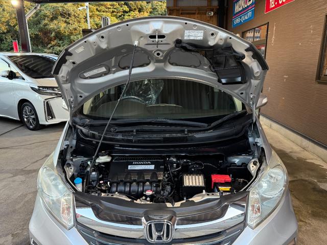 フリードハイブリッド ハイブリッド　プレミアムエディション　両側電動スライドドア／純正ナビ／ＣＤ／ＤＶＤ／ＢＬＵＥＴＯＯＴＨ／バックカメラ／後席フリップダウンモニター／ＥＴＣ／コーティング施工／禁煙車（48枚目）