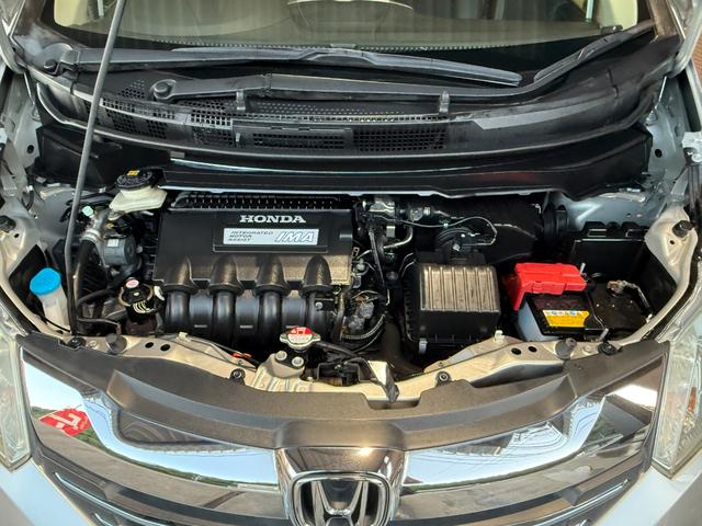フリードハイブリッド ハイブリッド　プレミアムエディション　両側電動スライドドア／純正ナビ／ＣＤ／ＤＶＤ／ＢＬＵＥＴＯＯＴＨ／バックカメラ／後席フリップダウンモニター／ＥＴＣ／コーティング施工／禁煙車（49枚目）