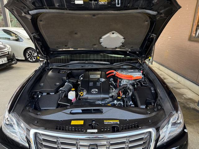 クラウンハイブリッド ロイヤルサルーン　純正ナビ／フルセグＴＶ／ＢＬＵＥＴＯＯＴＨ／ＥＴＣ／バックカメラ／全席電動シート／運転席シートヒーター／新品社外ステアリング／禁煙車／全国対応／コーティング施工（62枚目）