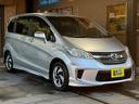 フリードハイブリッド ハイブリッド　プレミアムエディション　両側電動スライドドア／純正ナビ／ＣＤ／ＤＶＤ／ＢＬＵＥＴＯＯＴＨ／バックカメラ／後席フリップダウンモニター／ＥＴＣ／コーティング施工／禁煙車（2枚目）