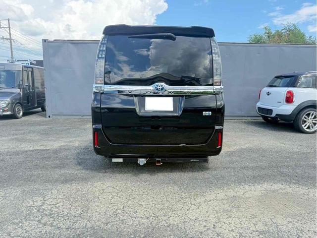 ヴォクシー ハイブリッドＶ　ＥＴＣ　バックカメラ　ＴＶ　オートクルーズコントロール　両側電動スライドドア　ＬＥＤヘッドランプ　スマートキー　アイドリングストップ　電動格納ミラー　後席モニター　３列シート　ＣＶＴ　アルミホイール（19枚目）