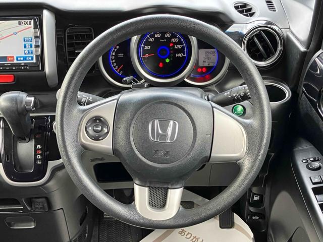 Ｎ－ＢＯＸカスタム Ｇ・Ｌパッケージ　バックカメラ　両側スライド・片側電動　ナビ　ＴＶ　オートライト　ＨＩＤ　スマートキー　アイドリングストップ　電動格納ミラー　ベンチシート　ＣＶＴ　盗難防止システム　ＡＢＳ　ＥＳＣ　ＣＤ　ＤＶＤ再生（3枚目）