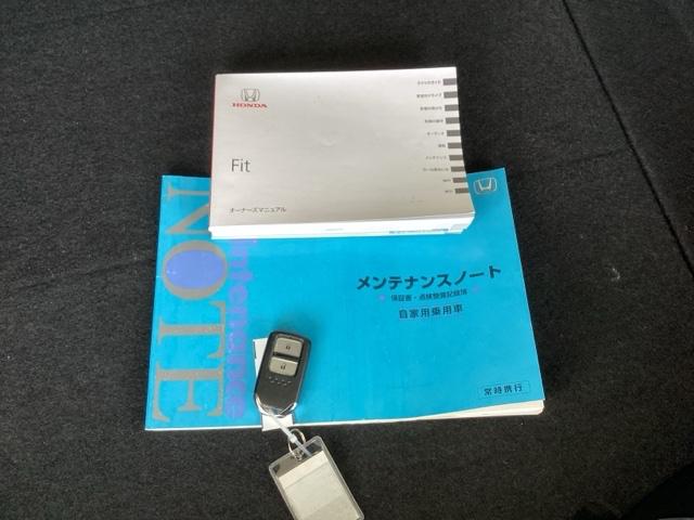 フィット １３Ｇ・Ｆパッケージ　純正メモリーナビＥＴＣスマートキー　アイドリングストップ付　デュアルエアバック　定期点検記録簿　１セグＴＶ　スマートＫ　イモビライザー　ＥＴＣ付き　ＤＶＤ再生可能　横滑防止　ナビ＆ＴＶ　ＰＷ　ＰＳ（20枚目）