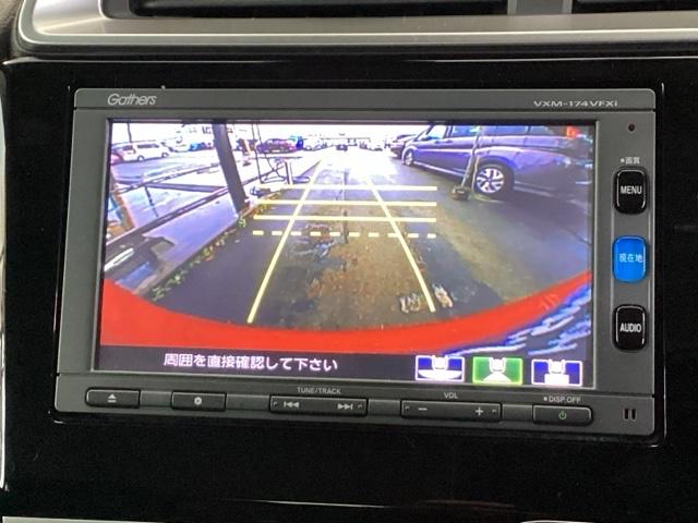 フィット １３Ｇ・Ｆパッケージコンフォートエディション　純正メモリナビ　衝突低減ブレーキ　ＥＴＣ　シティブレーキアクティブシステム　パワーウィンドウ　横滑り防止機能　キーレス　シートヒータ　インテリキー　地デジＴＶ　ＡＡＣ　ＴＶナビ　Ｉストップ　ＤＶＤ再生（12枚目）