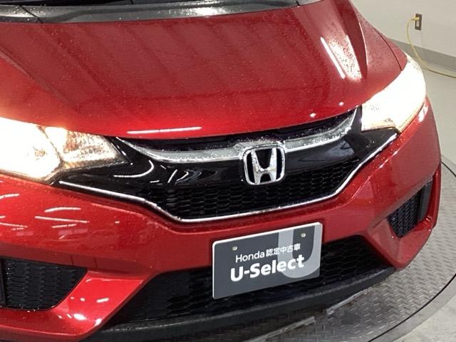 フィット １３Ｇ・Ｆパッケージコンフォートエディション　純正メモリナビ　衝突低減ブレーキ　ＥＴＣ　シティブレーキアクティブシステム　パワーウィンドウ　横滑り防止機能　キーレス　シートヒータ　インテリキー　地デジＴＶ　ＡＡＣ　ＴＶナビ　Ｉストップ　ＤＶＤ再生（23枚目）