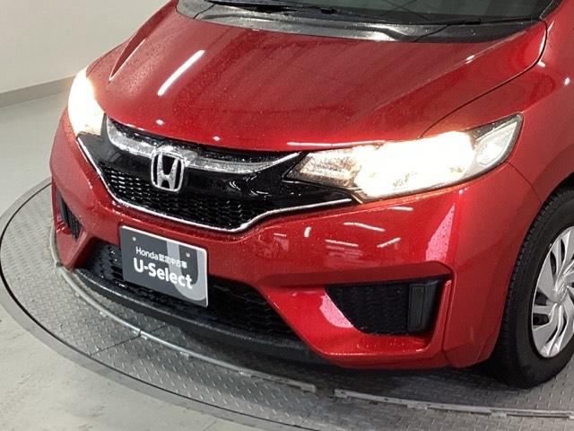 フィット １３Ｇ・Ｆパッケージコンフォートエディション　純正メモリナビ　衝突低減ブレーキ　ＥＴＣ　シティブレーキアクティブシステム　パワーウィンドウ　横滑り防止機能　キーレス　シートヒータ　インテリキー　地デジＴＶ　ＡＡＣ　ＴＶナビ　Ｉストップ　ＤＶＤ再生（24枚目）