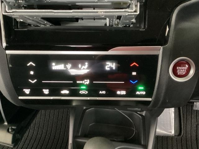 フィット １３Ｇ・Ｆパッケージコンフォートエディション　純正メモリナビ　衝突低減ブレーキ　ＥＴＣ　シティブレーキアクティブシステム　パワーウィンドウ　横滑り防止機能　キーレス　シートヒータ　インテリキー　地デジＴＶ　ＡＡＣ　ＴＶナビ　Ｉストップ　ＤＶＤ再生（37枚目）