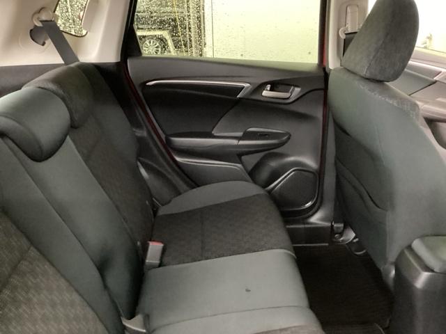 フィット １３Ｇ・Ｆパッケージコンフォートエディション　純正メモリナビ　衝突低減ブレーキ　ＥＴＣ　シティブレーキアクティブシステム　パワーウィンドウ　横滑り防止機能　キーレス　シートヒータ　インテリキー　地デジＴＶ　ＡＡＣ　ＴＶナビ　Ｉストップ　ＤＶＤ再生（57枚目）