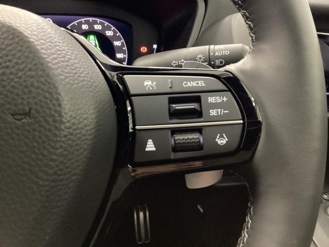 �X�e�A�����O�E�葤�Ɉ��S�^�]�x���@�\�̃z���_�Z���V���O���R���g���[������X�C�b�`