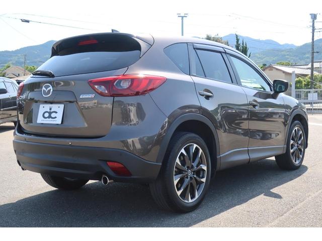 ＣＸ－５ ＸＤ　Ｌパッケージ　黒革　衝突軽減ブレーキ　地デジＴＶ　ＬＥＤライト　バックカメラ　レーダークルーズ　純正１９インチＡＷ　アドバンストキー　プッシュスタート　パワーシート　ＲＶＭ　シートヒーター　オートライト　ＥＴＣ（4枚目）