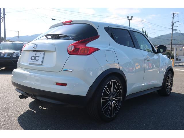 ジューク １５ＲＸ　タイプＶ　純正ナビ　地デジＴＶ　Ｂｌｕｅｔｏｏｔｈ　バックカメラ　ＤＶＤ再生　ＥＴＣ　社外１８インチＡＷ　車高調ローダウン　インテリジェントキー　オートライト　オートエアコン　電動格納ドアミラー（12枚目）