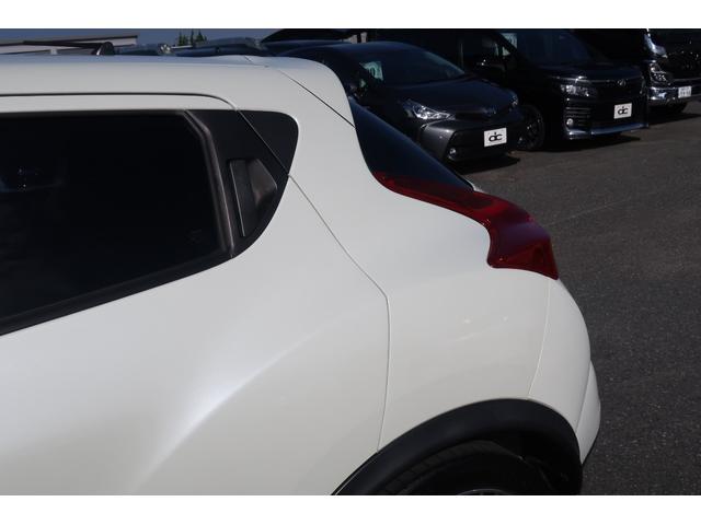ジューク １５ＲＸ　タイプＶ　純正ナビ　地デジＴＶ　Ｂｌｕｅｔｏｏｔｈ　バックカメラ　ＤＶＤ再生　ＥＴＣ　社外１８インチＡＷ　車高調ローダウン　インテリジェントキー　オートライト　オートエアコン　電動格納ドアミラー（68枚目）