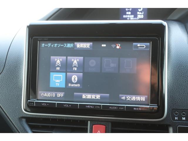 ヴォクシー ＺＳ　両側電動スライドドア　後席モニター　純正ナビ　地デジＴＶ　Ｂｌｕｅｔｏｏｔｈ　バックカメラ　ＤＶＤビデオ　ＥＴＣ　フロントフォグ　リヤ＆オートエアコン　オートライト　ＬＥＤヘッドライト　スマートキー（11枚目）
