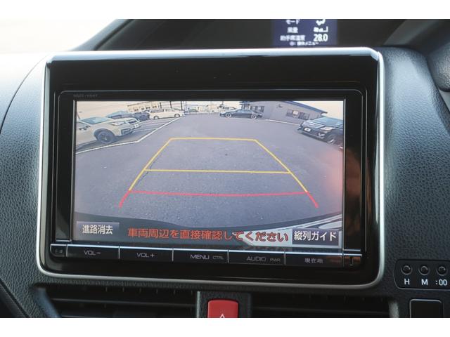 ヴォクシー ＺＳ　両側電動スライドドア　後席モニター　純正ナビ　地デジＴＶ　Ｂｌｕｅｔｏｏｔｈ　バックカメラ　ＤＶＤビデオ　ＥＴＣ　フロントフォグ　リヤ＆オートエアコン　オートライト　ＬＥＤヘッドライト　スマートキー（12枚目）