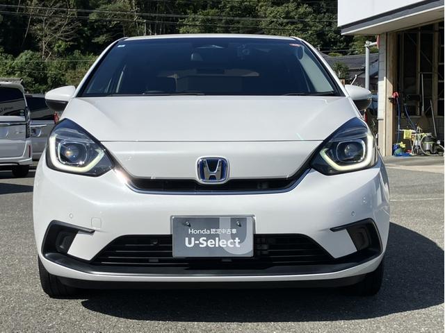 フィット e:HEVホーム 純正8型ナビ/前方ドラレコ/社外15インチAW/LEDヘッドライト/Bカメラ/1オーナー車 前後誤発進抑制機能 クリソナ 助手席エアバッグ 運転席エアバッグ 1オナ アイドリングストップ 禁煙 ABS(2枚目)