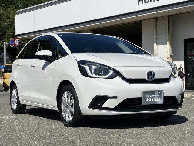 フィット e:HEVホーム 純正8型ナビ/前方ドラレコ/社外15インチAW/LEDヘッドライト/Bカメラ/1オーナー車 前後誤発進抑制機能 クリソナ 助手席エアバッグ 運転席エアバッグ 1オナ アイドリングストップ 禁煙 ABS(3枚目)