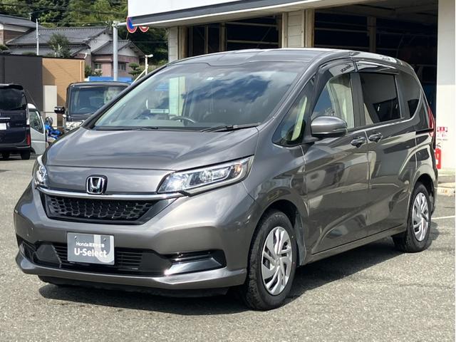フリード G・ホンダセンシング 純正7型ナビ/両側PSD//ETC/LEDヘッドライト/シートヒーター/Bカメラ/1オーナー車 Fセグ 追突被害軽減ブレーキ iストップ Wエアバッグ パワーウィンドウ 1オ-ナ- スマートキ 禁煙(4枚目)