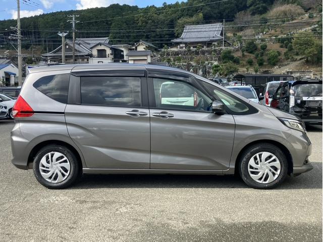 フリード G・ホンダセンシング 純正7型ナビ/両側PSD//ETC/LEDヘッドライト/シートヒーター/Bカメラ/1オーナー車 Fセグ 追突被害軽減ブレーキ iストップ Wエアバッグ パワーウィンドウ 1オ-ナ- スマートキ 禁煙(5枚目)