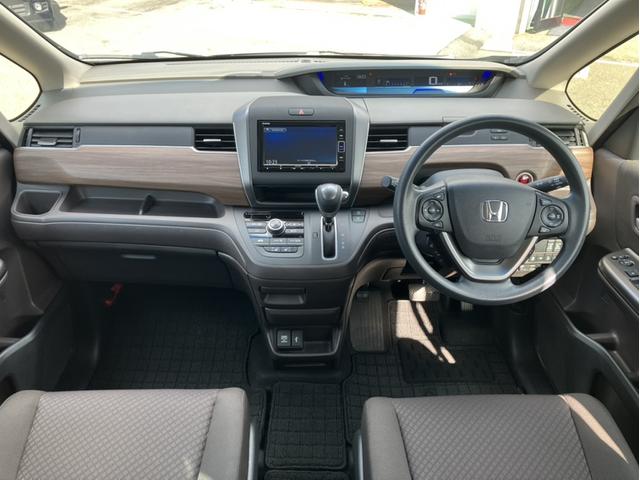 フリード G・ホンダセンシング 純正7型ナビ/両側PSD//ETC/LEDヘッドライト/シートヒーター/Bカメラ/1オーナー車 Fセグ 追突被害軽減ブレーキ iストップ Wエアバッグ パワーウィンドウ 1オ-ナ- スマートキ 禁煙(9枚目)