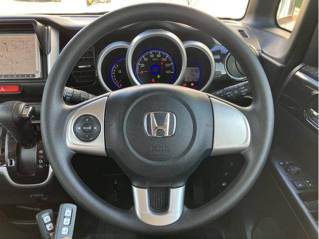 N-BOXカスタム G・Lパッケージ 社外7型ナビ/地デジチューナー/左PSD/Bカメラ/黒シートカバー/1オーナー DVDナビ 電動格納ミラ- アイドリングストップ車 禁煙車両 ナビ・TV スマキ- フロントベンチシート オートエアコン(21枚目)