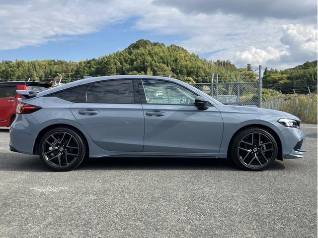 シビック ｅ：ＨＥＶ　Ｈコネクトナビ／Ｆロアスカート／Ｒスポイラー／ブラックエンブレム／３カメドラレコ／ＢＯＳＥサウンド／ＥＴＣ２．０／Ｐシート／Ｐセンサー　盗難防止システム　クリアランスソナー　オートクルーズコントロール（5枚目）