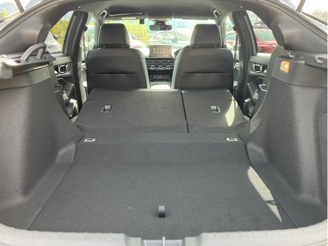 シビック ｅ：ＨＥＶ　Ｈコネクトナビ／Ｆロアスカート／Ｒスポイラー／ブラックエンブレム／３カメドラレコ／ＢＯＳＥサウンド／ＥＴＣ２．０／Ｐシート／Ｐセンサー　盗難防止システム　クリアランスソナー　オートクルーズコントロール（15枚目）