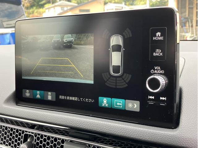 シビック ｅ：ＨＥＶ　Ｈコネクトナビ／Ｆロアスカート／Ｒスポイラー／ブラックエンブレム／３カメドラレコ／ＢＯＳＥサウンド／ＥＴＣ２．０／Ｐシート／Ｐセンサー　盗難防止システム　クリアランスソナー　オートクルーズコントロール（17枚目）