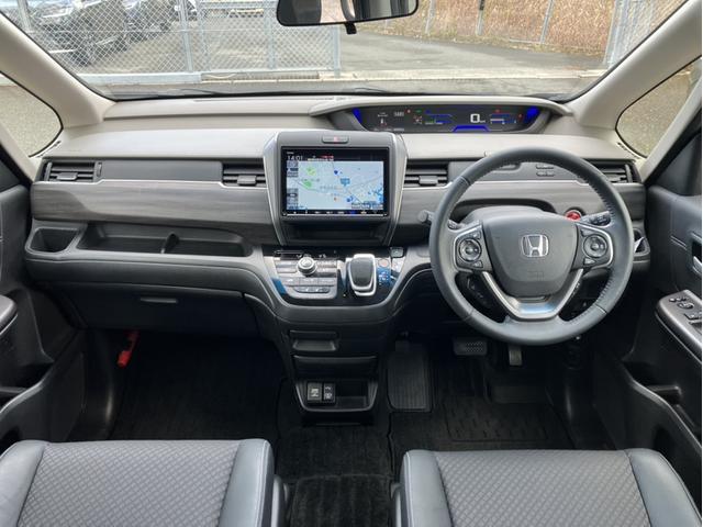 フリードハイブリッド ハイブリッド・Gホンダセンシング Sパケ/Cパケ/フルエアロ/9型ナビ/モデューロAW/OPグリル/OPフォグ/前後ドラレコ ハーフレザーS 軽減ブレーキ キーフリーシステム 電動格納式ドアミラー Bluetooth音楽 1オ-ナ-(10枚目)