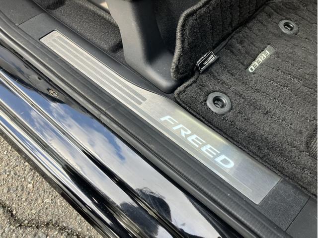 フリードハイブリッド ハイブリッド・Gホンダセンシング Sパケ/Cパケ/フルエアロ/9型ナビ/モデューロAW/OPグリル/OPフォグ/前後ドラレコ ハーフレザーS 軽減ブレーキ キーフリーシステム 電動格納式ドアミラー Bluetooth音楽 1オ-ナ-(26枚目)