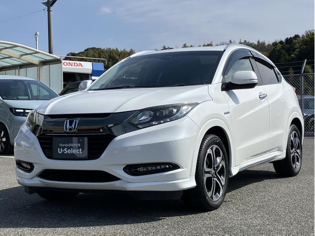 ヴェゼル ハイブリッドＺ・ホンダセンシング　社外８インチナビ／Ｂカメラ／ＥＴＣ／シートヒーター／１オーナー車　地デジチューナー　スマートキ－　運転席助手席エアバッグ　Ｂｌｕｅｔｏｏｔｈ対応　電動格納ドアミラー　車線逸脱　１オーナ－　ＥＳＣ（4枚目）