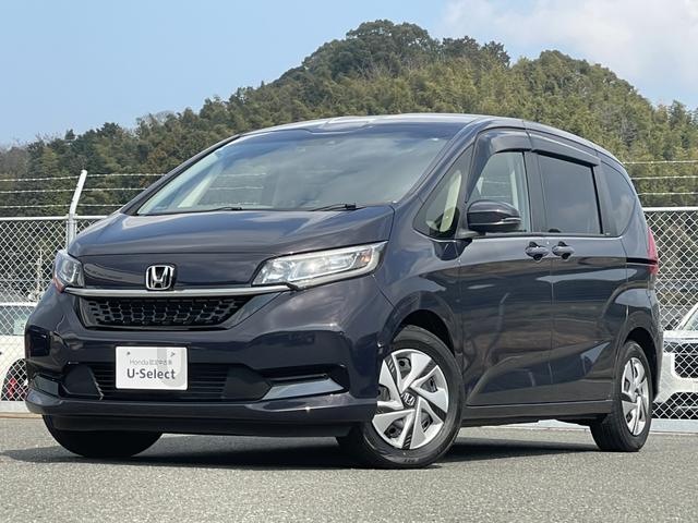 フリードハイブリッド ハイブリッド・Ｇ　純正７型ナビ／前方ドラレコ／両側ＰＳＤ／Ｂカメラ／ＥＴＣ／シートヒーター／ＬＥＤヘッドライト／自社レンタＵＰ　電動格納ドアミラー　ＬＫＡＳ　１オーナー車　両側パワスラドア　追従クルコン　フルセグテレビ（4枚目）