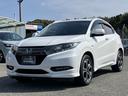 ヴェゼル ハイブリッドＺ・ホンダセンシング　社外８インチナビ／Ｂカメラ／ＥＴＣ／シートヒーター／１オーナー車　地デジチューナー　スマートキ－　運転席助手席エアバッグ　Ｂｌｕｅｔｏｏｔｈ対応　電動格納ドアミラー　車線逸脱　１オーナ－　ＥＳＣ（4枚目）