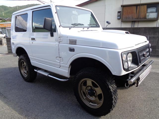 ジムニー ランドベンチャー　ＪＡ２２Ｗターボ　ＡＴ　リフトアップ　社外フロント＆サイド＆リアバンパー　背面タイヤレス　社外ハンドル　社外１６インチアルミ＆ヨコハマジオランダー　アンダーガード　外装同色塗装済　ＣＤ　ＵＳＢ（5枚目）