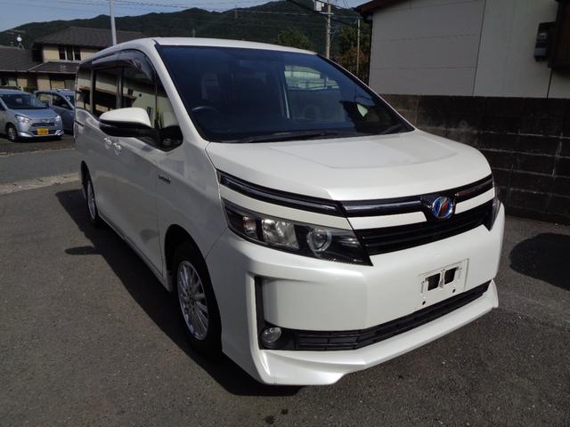 ヴォクシー ハイブリッドV 禁煙車 プッシュスタート スマートキー 後席モニター 両側電動ドア 純正9型ナビ フルセグTV DVD再 Bluetooth Bカメラ ETC 純正シートカバー LEDヘッドランプ 前席シートヒーター(3枚目)