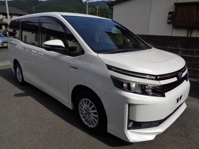 ヴォクシー ハイブリッドV 禁煙車 プッシュスタート スマートキー 後席モニター 両側電動ドア 純正9型ナビ フルセグTV DVD再 Bluetooth Bカメラ ETC 純正シートカバー LEDヘッドランプ 前席シートヒーター(5枚目)