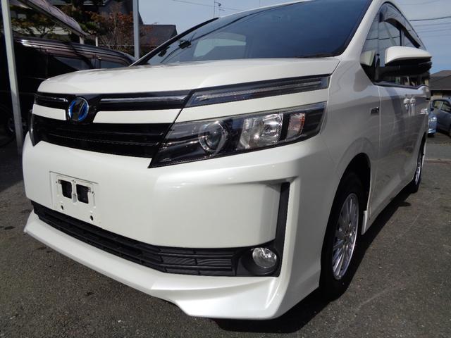 ヴォクシー ハイブリッドV 禁煙車 プッシュスタート スマートキー 後席モニター 両側電動ドア 純正9型ナビ フルセグTV DVD再 Bluetooth Bカメラ ETC 純正シートカバー LEDヘッドランプ 前席シートヒーター(6枚目)