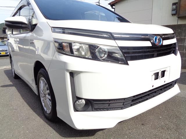 ヴォクシー ハイブリッドV 禁煙車 プッシュスタート スマートキー 後席モニター 両側電動ドア 純正9型ナビ フルセグTV DVD再 Bluetooth Bカメラ ETC 純正シートカバー LEDヘッドランプ 前席シートヒーター(7枚目)