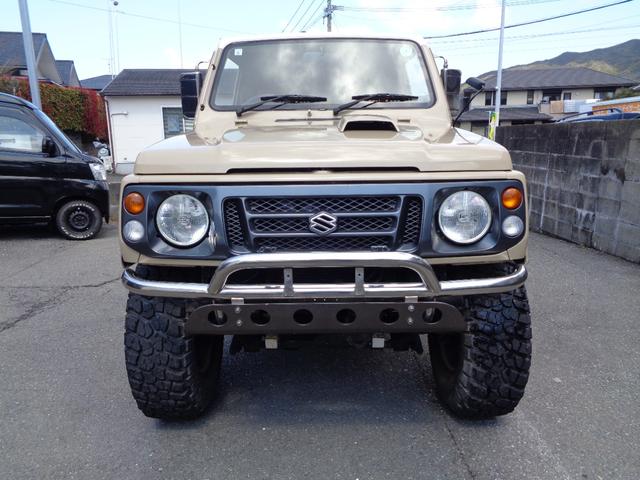 ジムニー ワイルドウインド　禁煙車　リフトアップ　１５インチアルミ　オーバーフェンダー　前後社外バンパー　外マフラー　シートカバー　ＬＥＤヘッドランプ　ＣＤデッキ　Ｂｌｕｅｔｏｏｔｈ　ＵＳＢ　新品ＥＴＣ　リアガラスフィルム施工（2枚目）